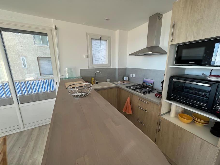 Le Carrousel - Apt Vue Mer - Plage A 10 M - Clim - Wifi กาเนต์-อ็อง-รูสซียง ภายนอก รูปภาพ